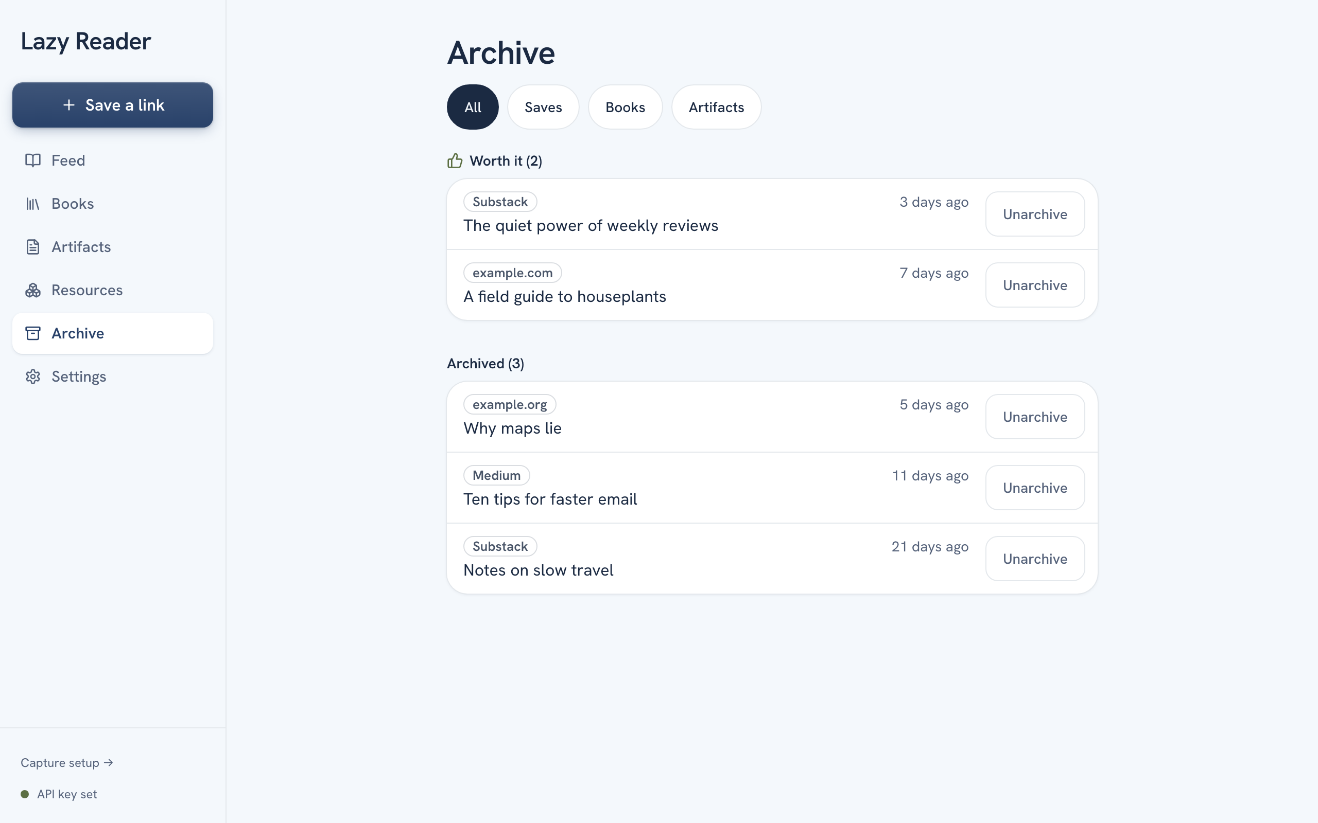 The Archive page on a computer with the All, Saves, Books and Artifacts chips, a Worth it group with two items and an Archived group with three items, each with an Unarchive button